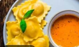 From the supplied Gen-Z app menu · presentation may differ Veg Gravy Momo — photo from the supplied Gen-Z app menu